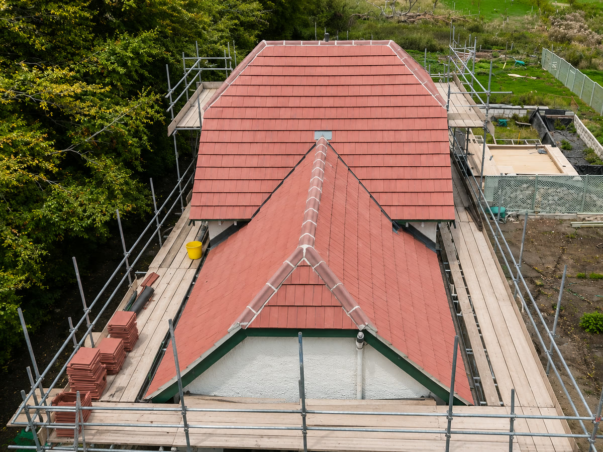 Completed re-roof - new clay tiles by Derby & Nottingham Roofing